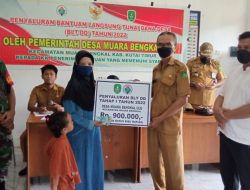 Babinsa Koramil 0909-05 Muara Bengkal Kawal Penyerahan Bantuan Langsung Tunai Pemerintah