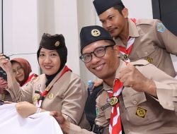 Peringati HUT Pramuka, Kirab Bendera Merah Putih 63 Meter di Bontang